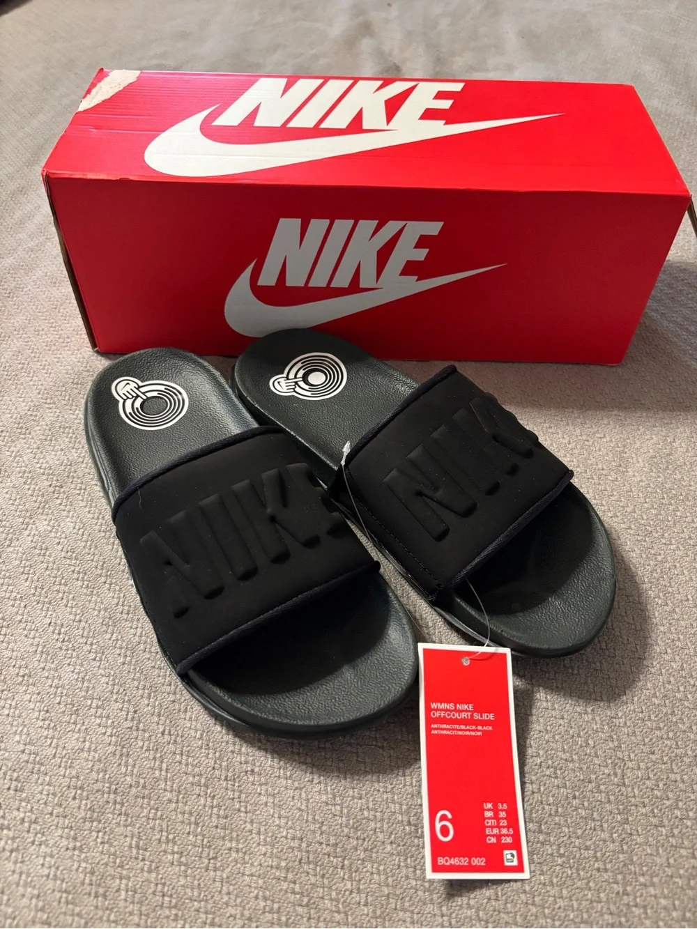 Nike Black Kids Slide Sandals with Embossed Logo